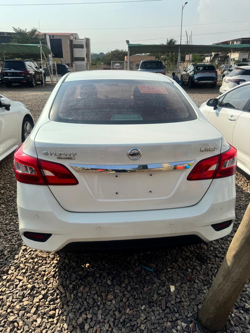 Commercial sedan rear view showing luggage space