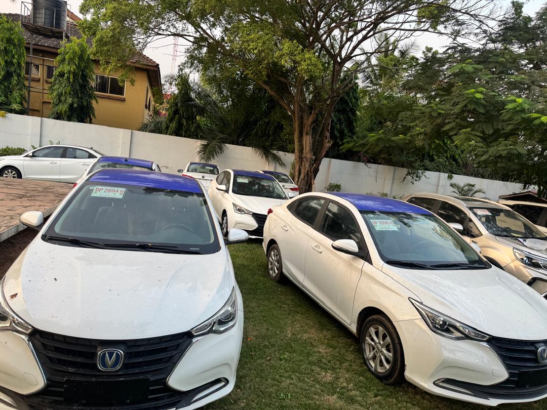 Fleet yard with multiple electric vehicles at central depot staging