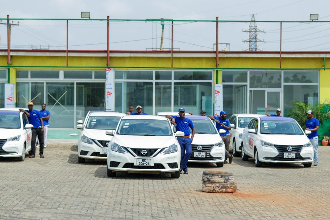 Axtro driver team with the EV fleet at the operational hub