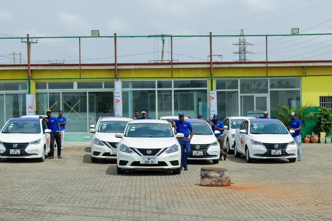 EV drivers and vehicles assembled at the Accra dispatch depot