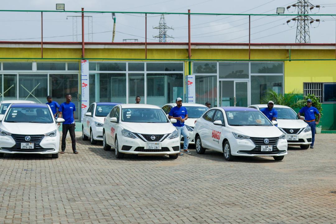 Axtro commercial EV team staging vehicles for a shift handoff